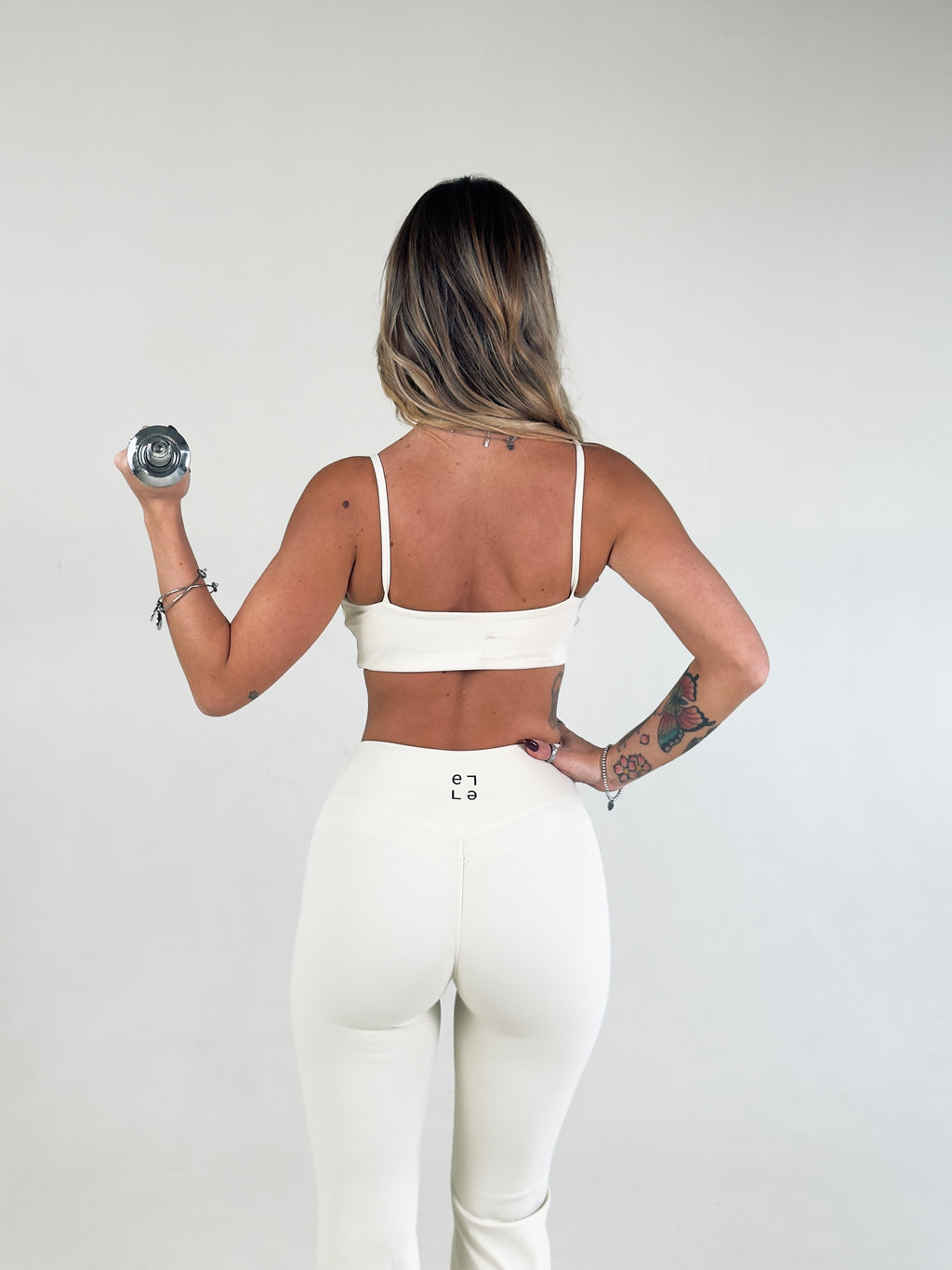 Top a spalla Eleganza Sportiva  Crema