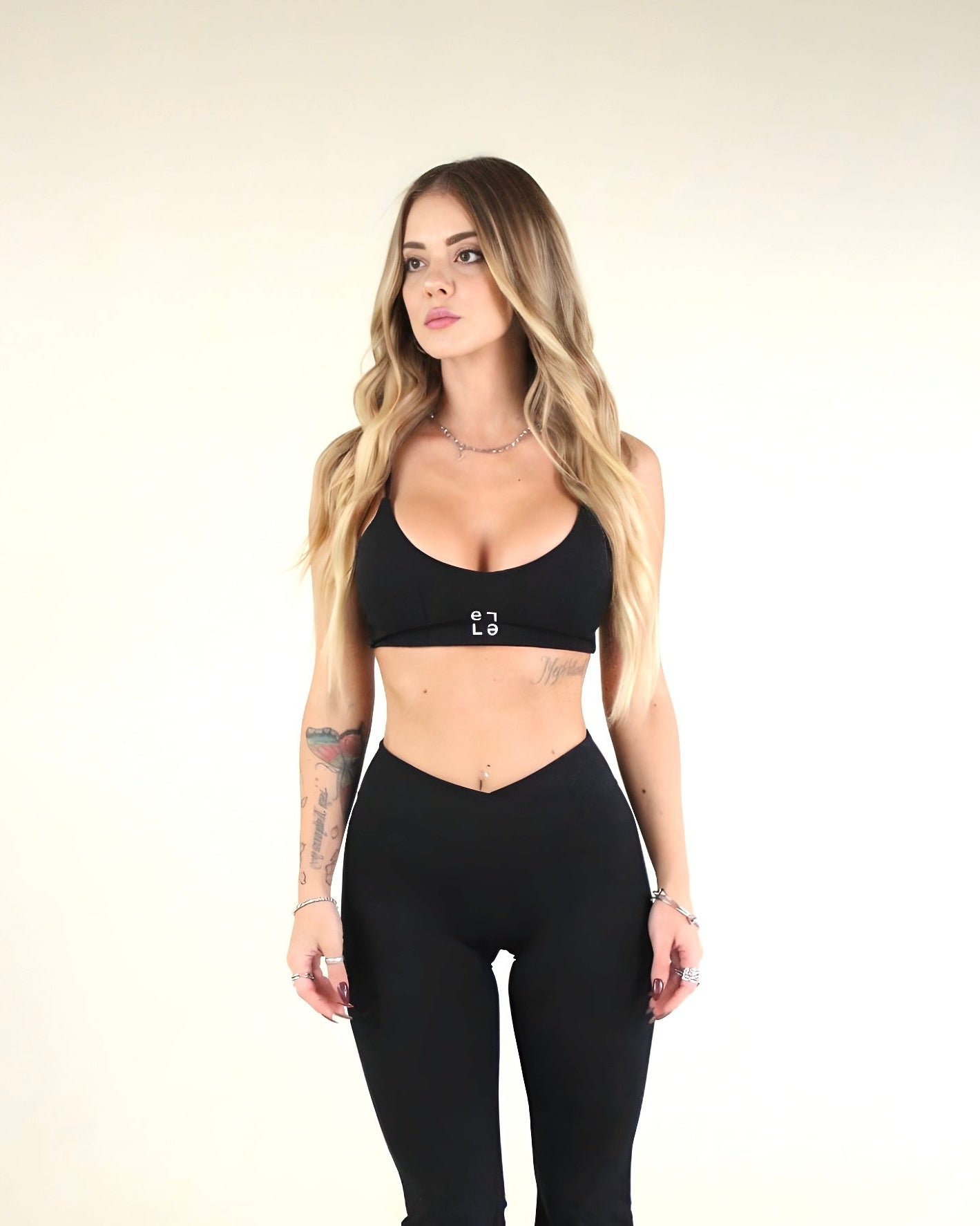 Top a spalla Eleganza Sportiva  Nero