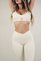 Top a spalla Eleganza Sportiva  Crema